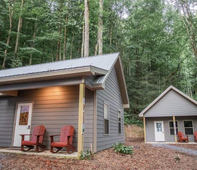 Cabins with rocking chairs on the porch